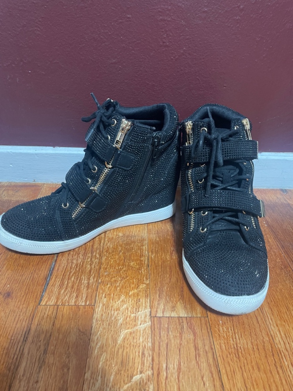 Black High-Top Wedge Sneakers with Gold Zipper Accents